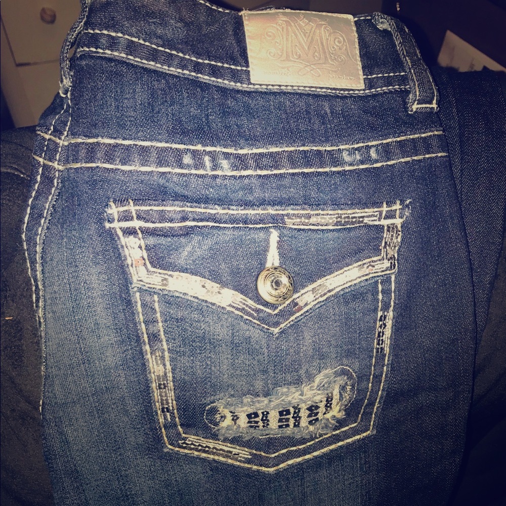 blue jeans with silver sequins embellishments